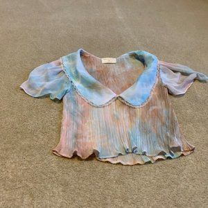 Repeat Mark Marbled Look Cropped Pleated Top